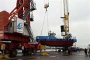 The first multifunctional steel float is thrown into the water