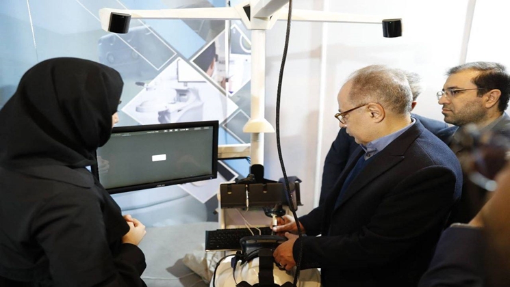 Unveiling of a dental surgery training simulator at the Made in Iran exhibition